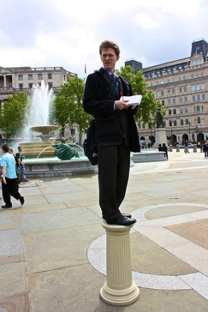 man on pedestal